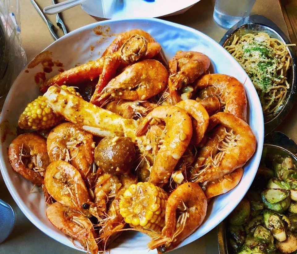 Seafood platters on a casual restaurant table.