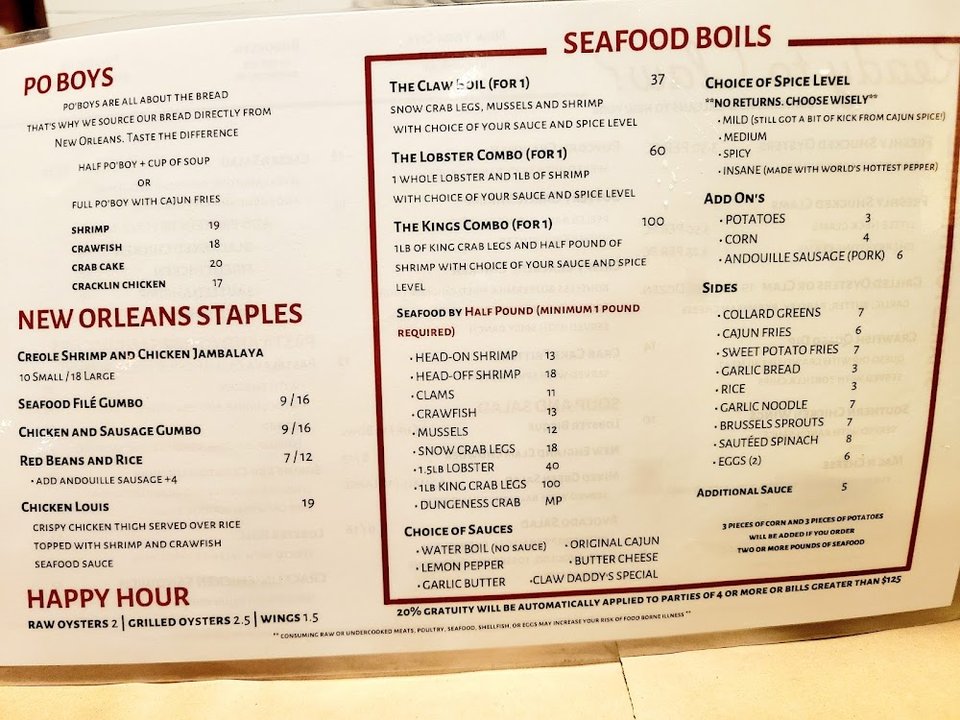 Printed menu page for seafood starters.